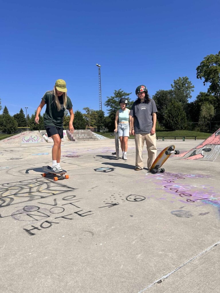 Walkers and skateboarders on the Grand Bend boardwalk
