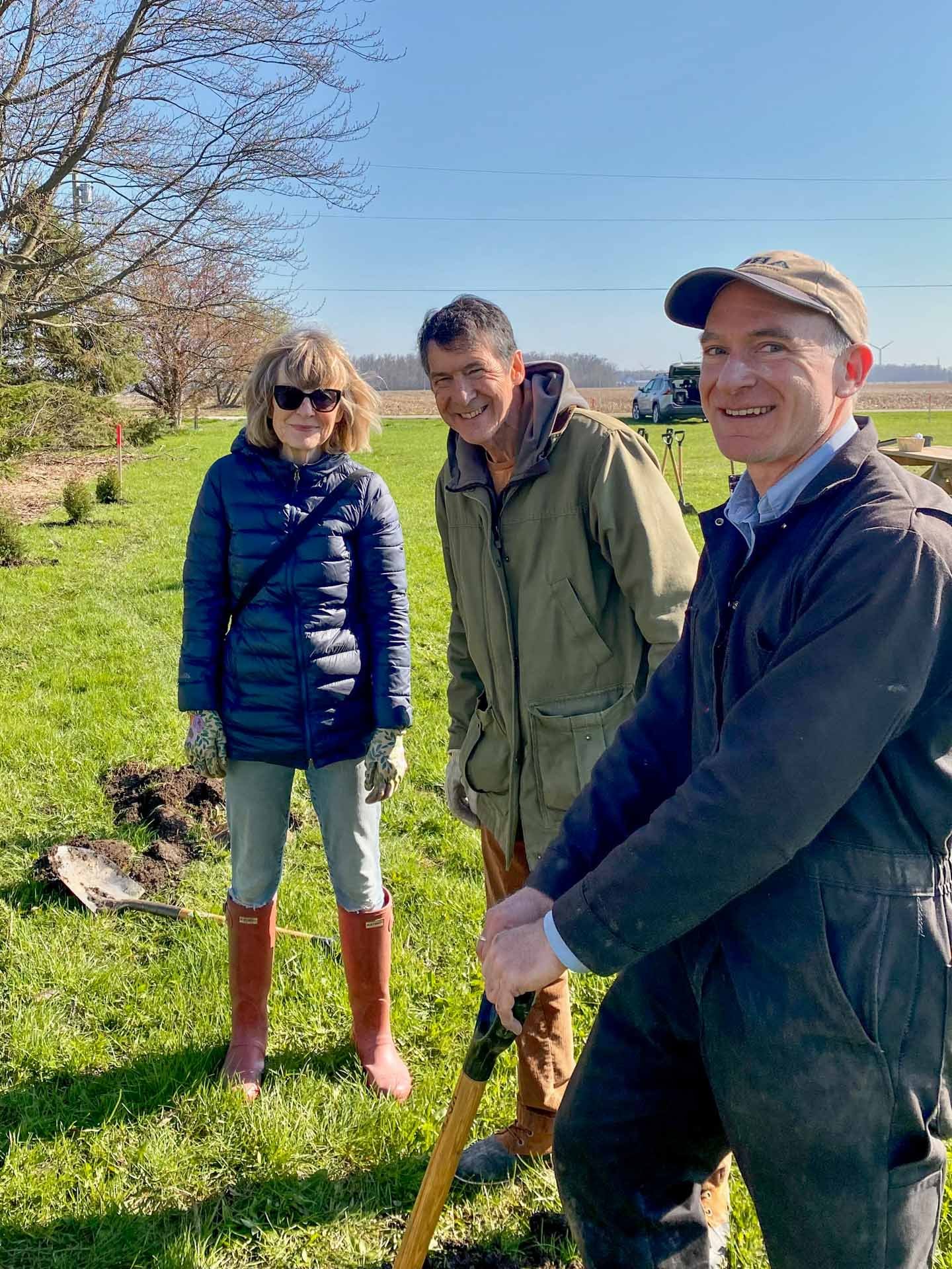 Ian Jean, Pat Morden and Max Morden with a shovel at a Tree People planting
