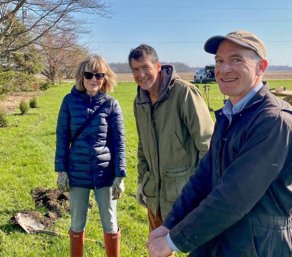 Ian Jean, Pat Morden and Max Morden with a shovel at a Tree People planting